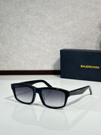 Balenciaga oversized square sunglasses with black frame and dark lenses