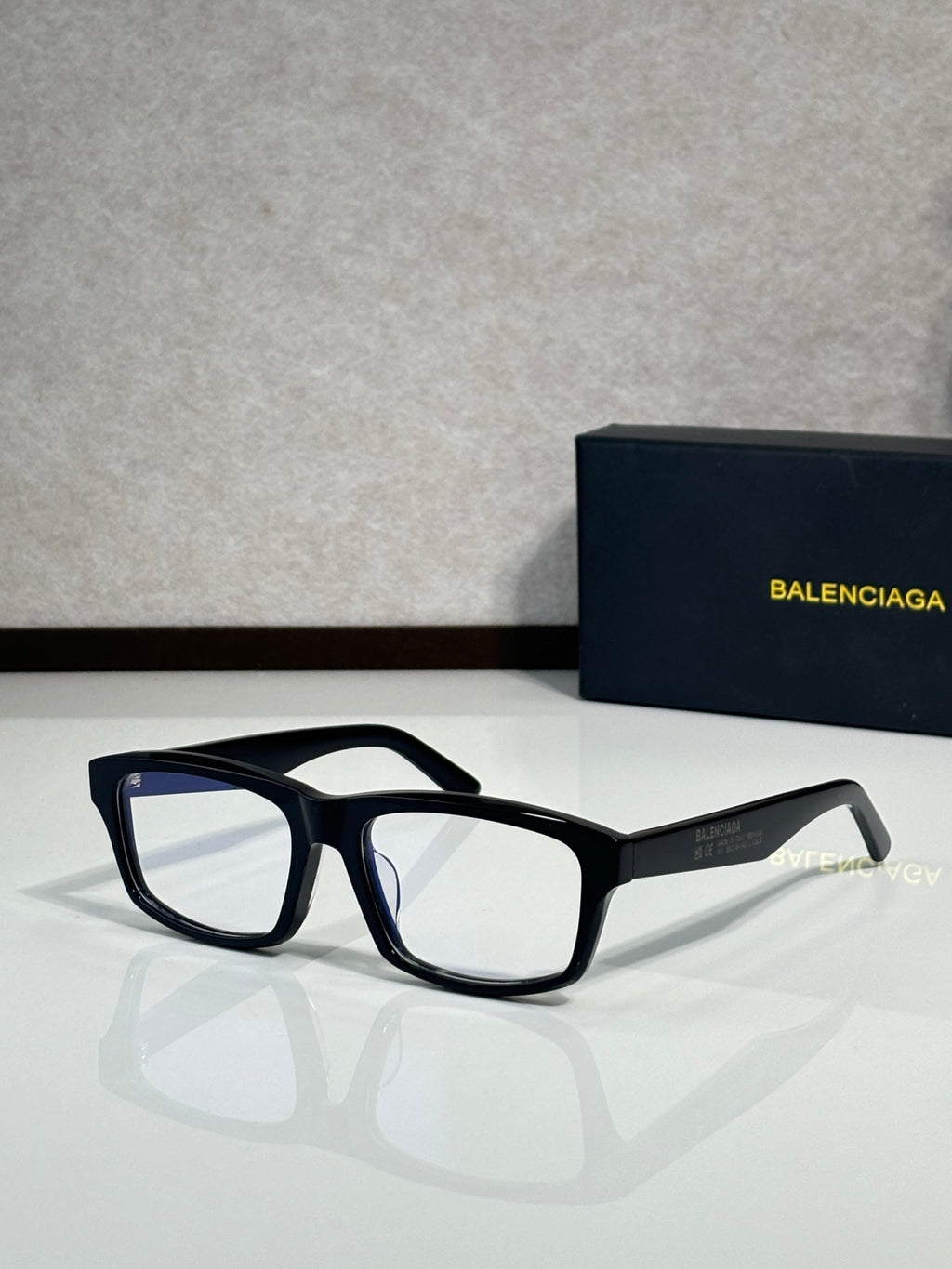 Balenciaga oversized square sunglasses with black frame and dark lenses