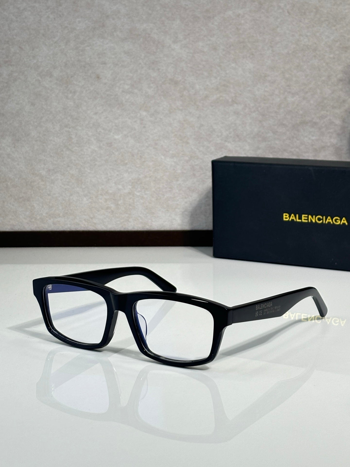 Balenciaga oversized square sunglasses with black frame and dark lenses