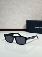 Balenciaga oversized square sunglasses with black frame and dark gray lenses