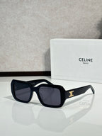 Celine dark square sunglasses with gold logo on temple.