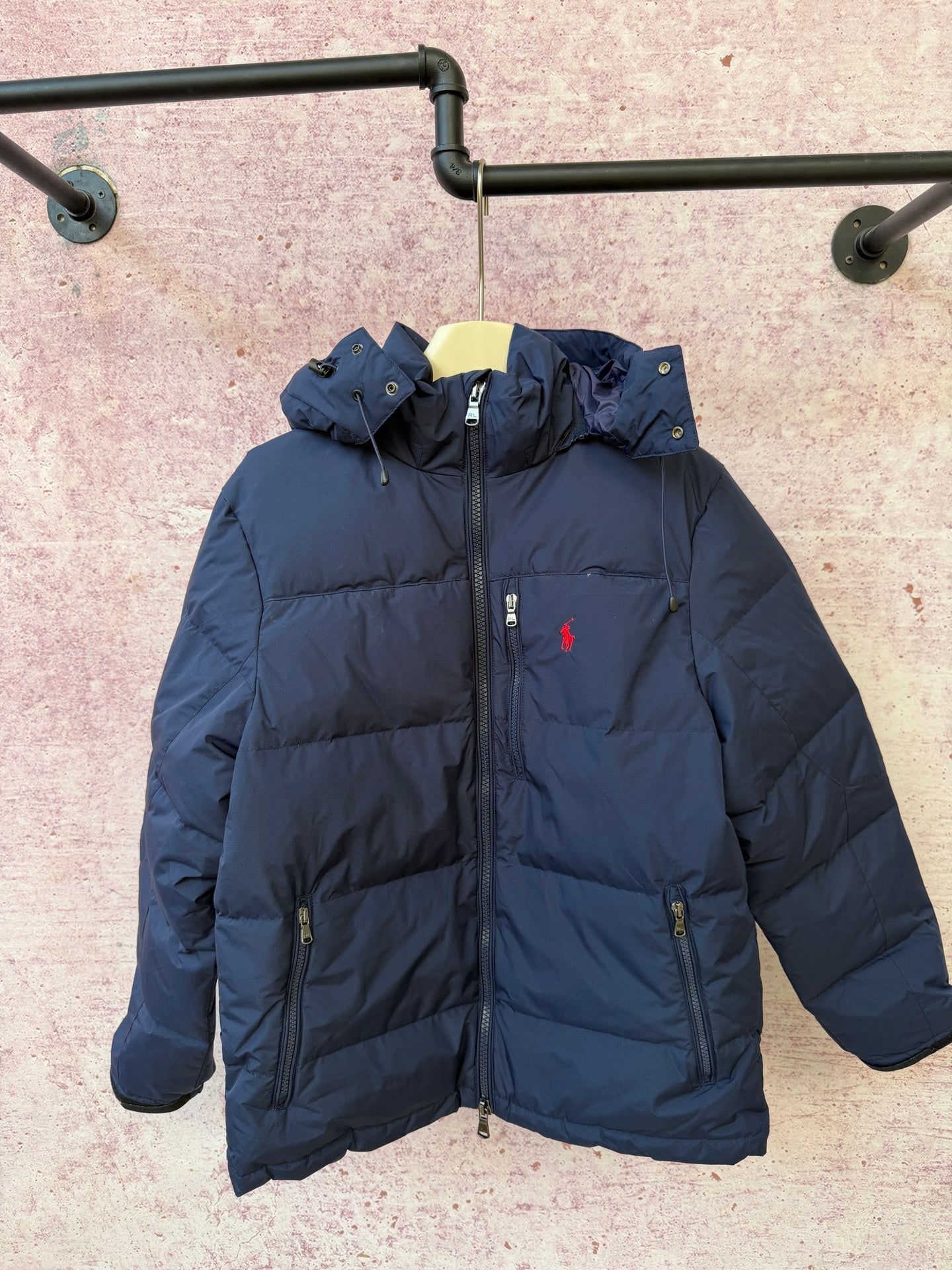 Navy hooded puffer jacket with full-zip front and side zip pockets