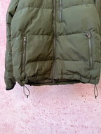Olive puffer jacket with full zipper and quilted front panel