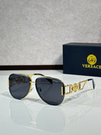 Versace sunglasses with gold frame and dark blue mirrored lenses