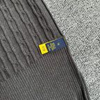 Dark gray knit cardigan label detail with Polo Ralph Lauren brand tab