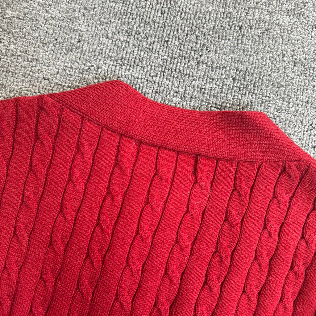 Red cable-knit cardigan ribbed crew collar and neckline texture