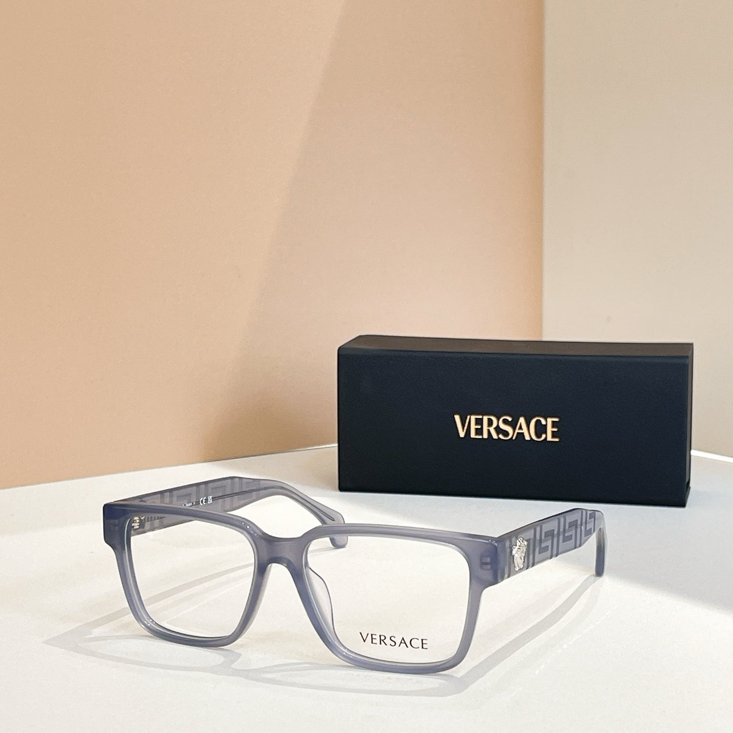 Versace eyeglasses, light blue-gray square frames, logo temple detail
