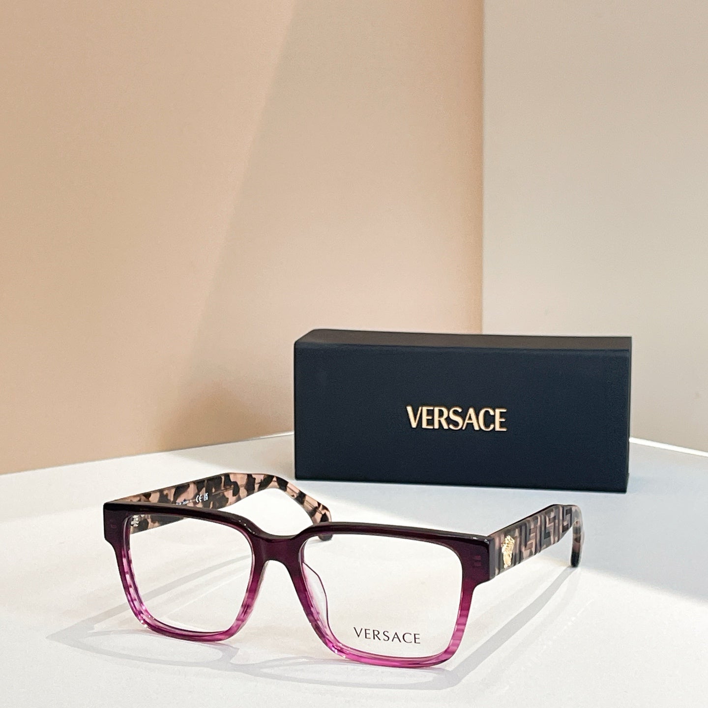 Versace eyeglasses, burgundy pink square frames, logo temple detail