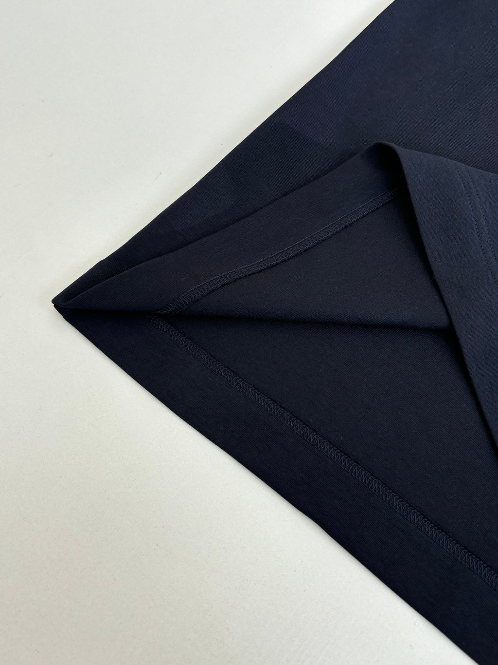 Fendi short-sleeve T-shirt in dark navy, close-up of neckline and side seam