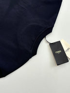 Fendi short-sleeve T-shirt in dark navy with Fendi tag, angled close-up