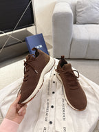 Dior unisex brown sneakers with textured knit uppers, lace-up closure, white soles