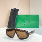Bottega Veneta sunglasses with dark tortoiseshell frame and brown lenses, with black case