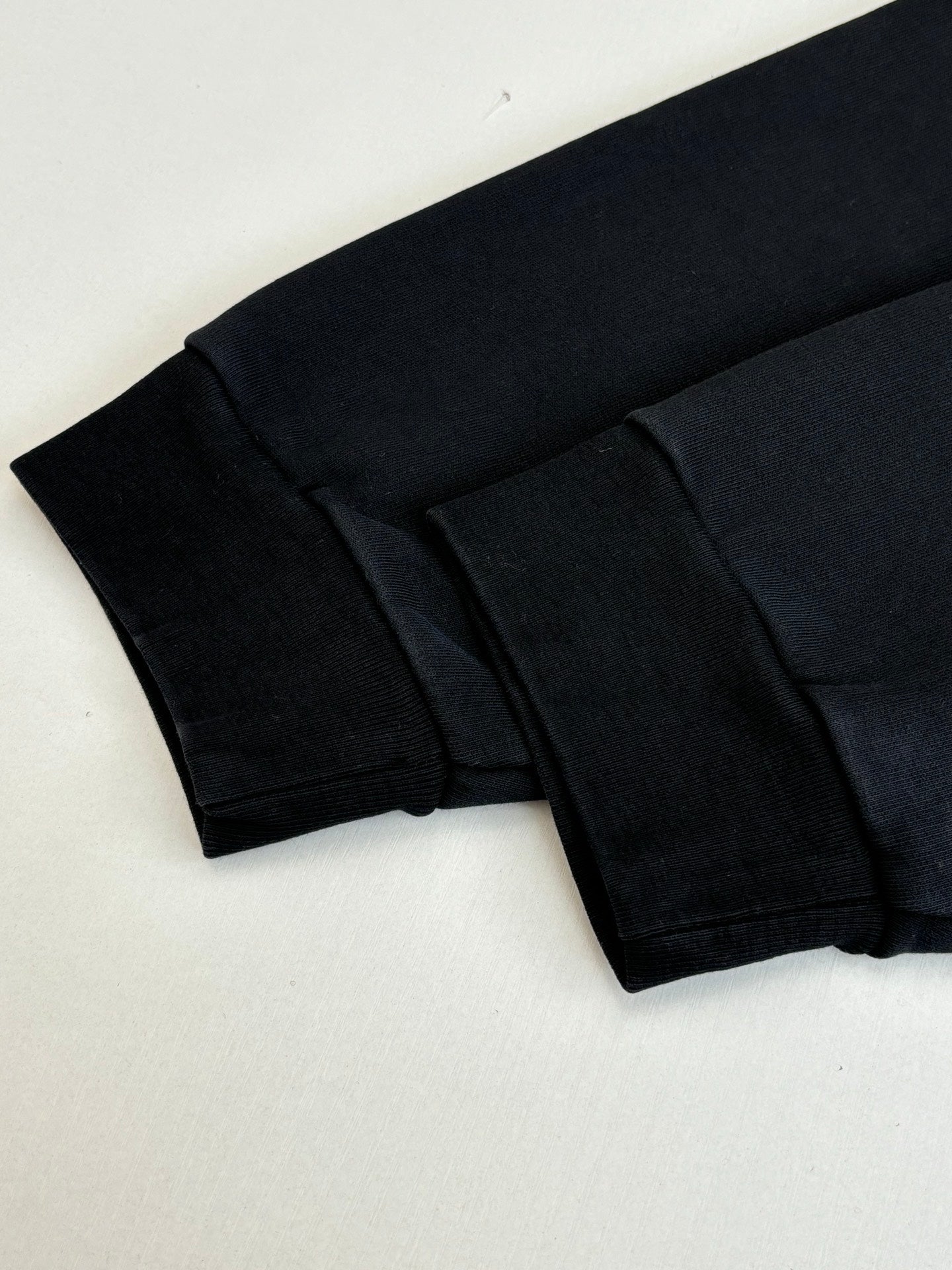 Balenciaga long-sleeve top with ribbed cuff and folded sleeve edge