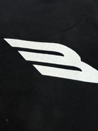 Balenciaga top with large white logo on black fabric