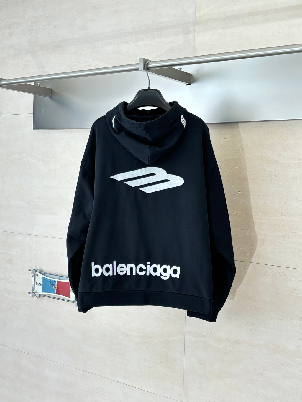 Balenciaga black hoodie with large front logo print and hood