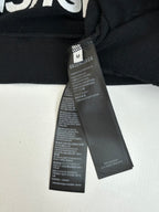 Balenciaga top interior care tags at neckline