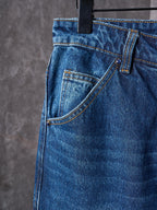 Louis Vuitton blue denim pants close-up of side pocket and top stitching