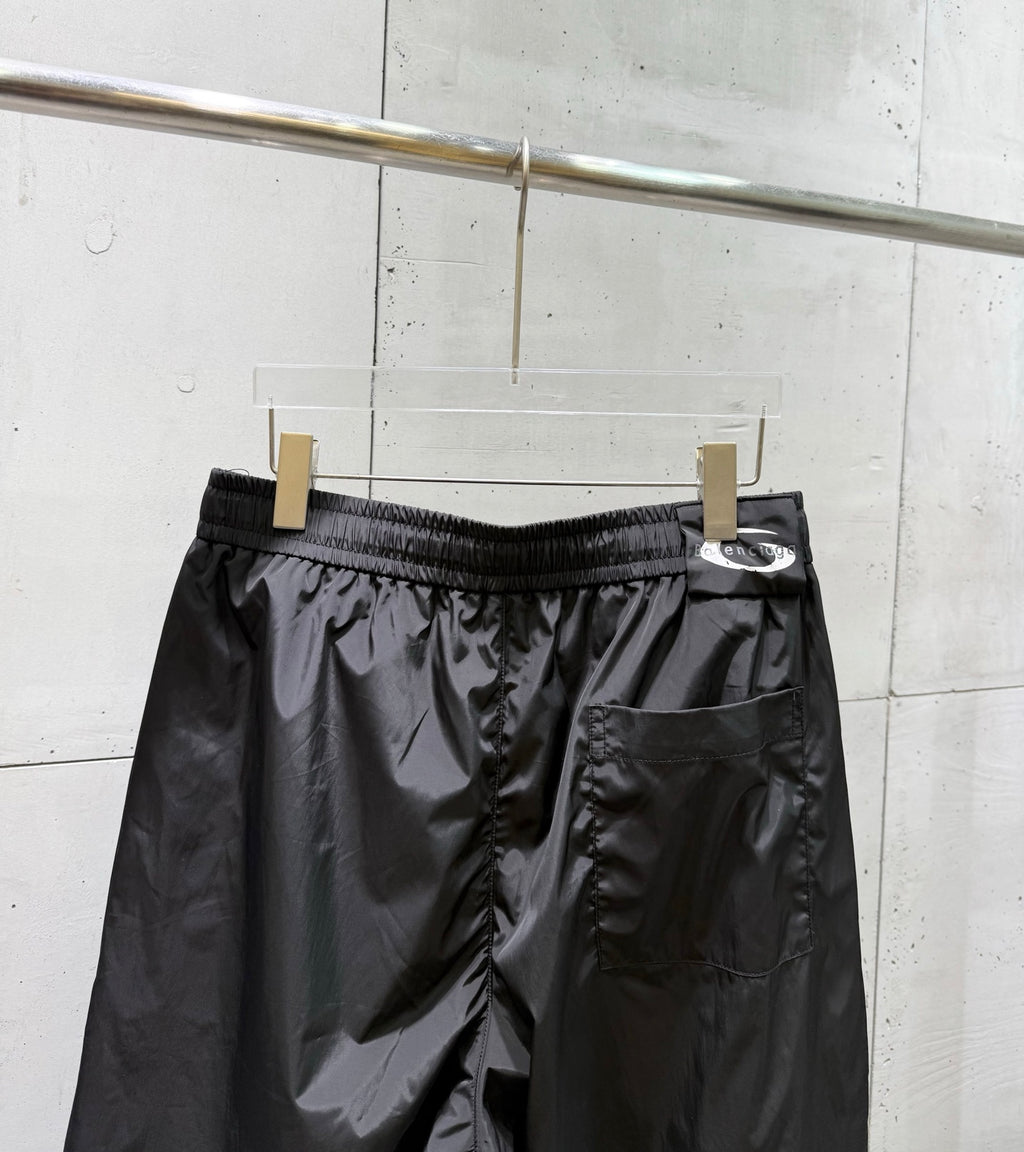 Balenciaga black pants front view with elastic waistband and side pockets