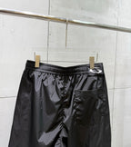 Balenciaga black pants front view with elastic waistband and side pockets