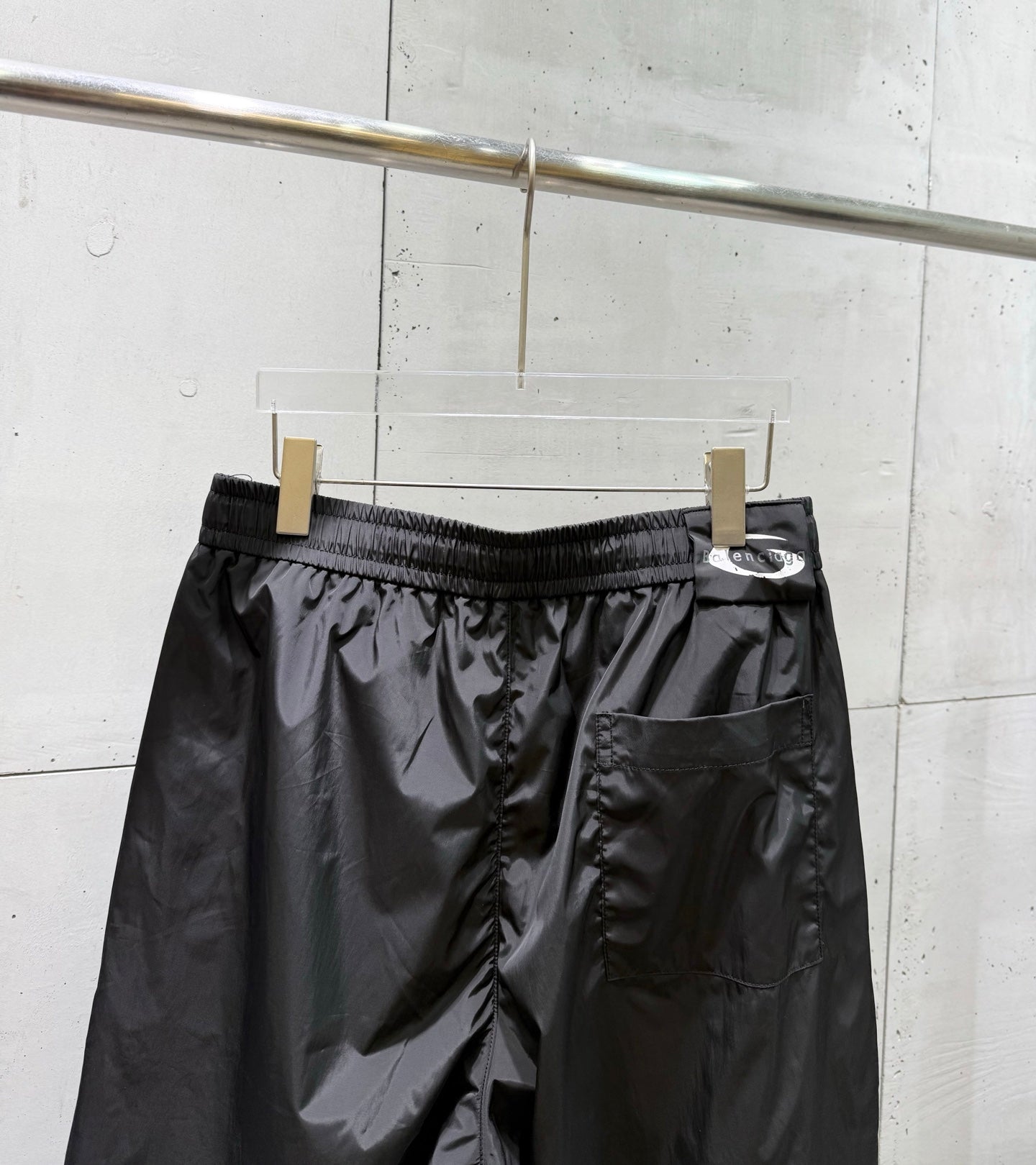 Balenciaga black pants front view with elastic waistband and side pockets