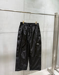 Balenciaga black wide-leg pants with elastic waistband and side pockets