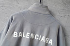 Light blue Balenciaga sweatshirt with BALENCIAGA logo on the back
