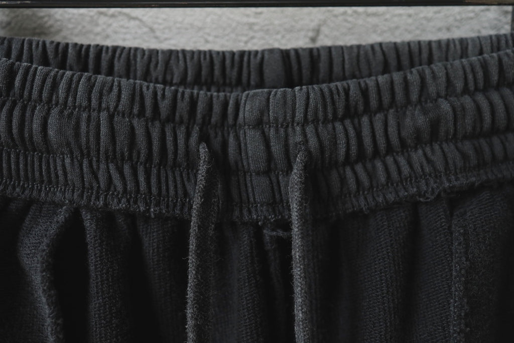 Black Balenciaga waistband close-up with gathered elastic detail