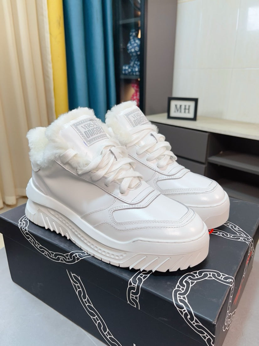Versace white sneakers, side view with faux-fur collar and sculpted tread sole