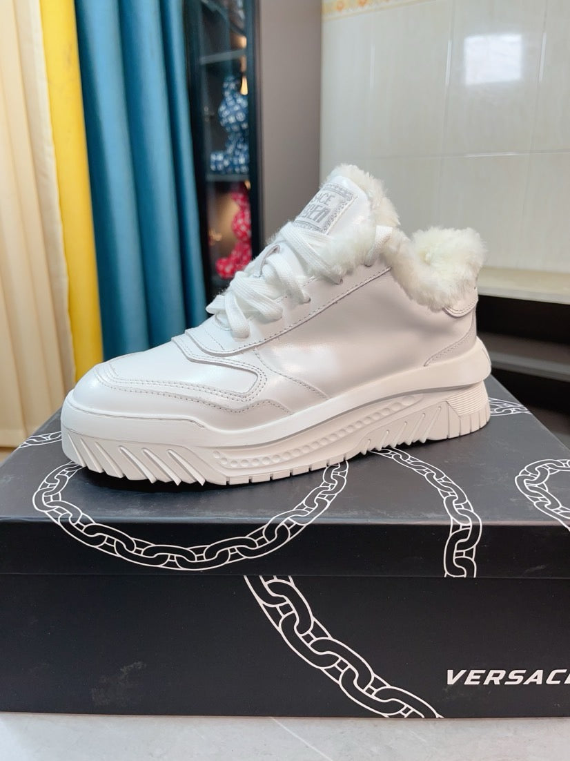 Versace sneakers in white with faux-fur trim, lace-up front, chunky sole