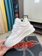 Versace white sneakers with faux-fur collar and lace-up vamp, side angle