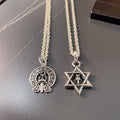 Silver pendant necklaces with round emblem and star pendant charms