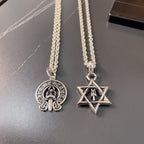 Silver pendant necklaces with round emblem and star pendant charms