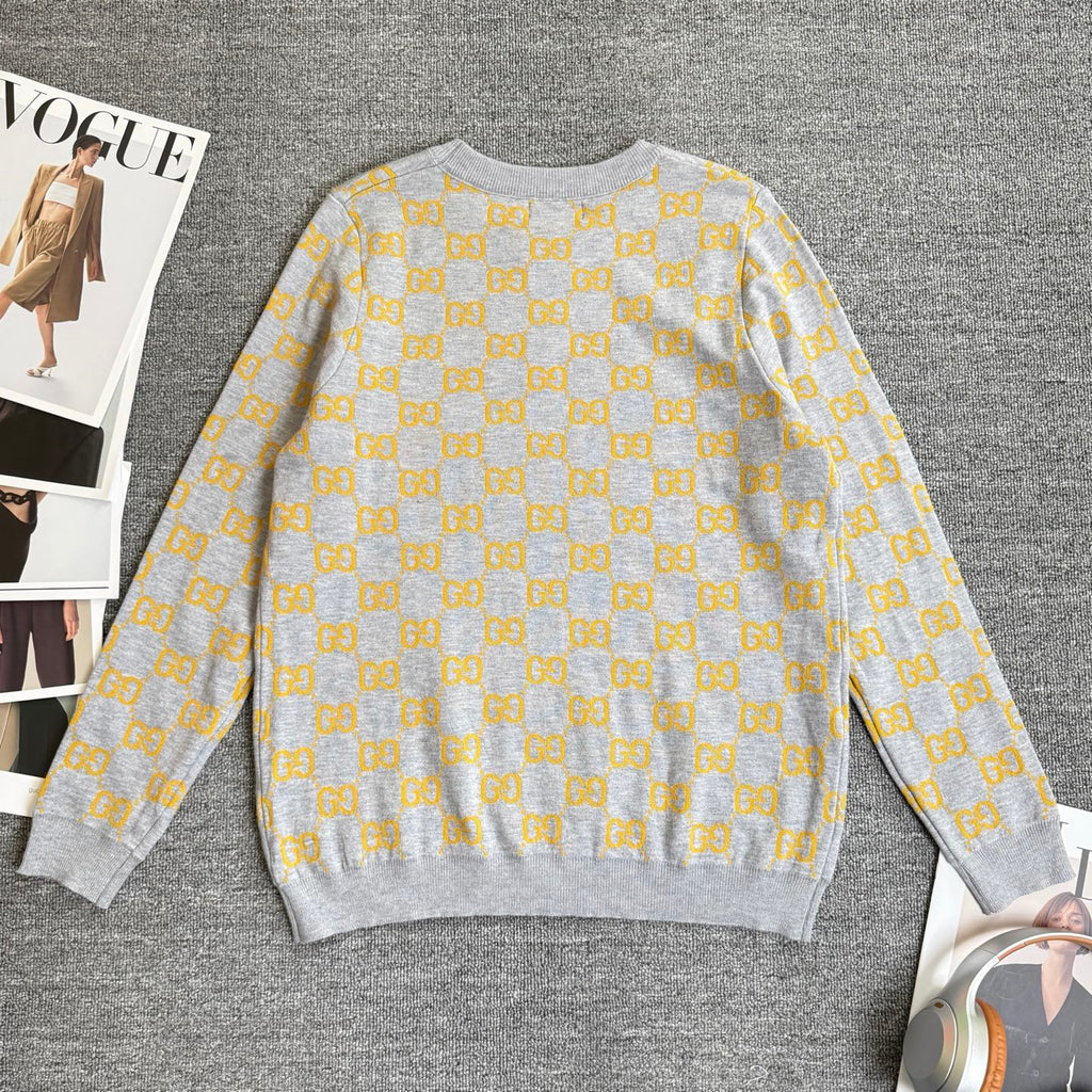Long-sleeve knit sweater in heather gray with yellow GG logo allover pattern