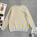 Long-sleeve knit sweater in heather gray with yellow GG logo allover pattern