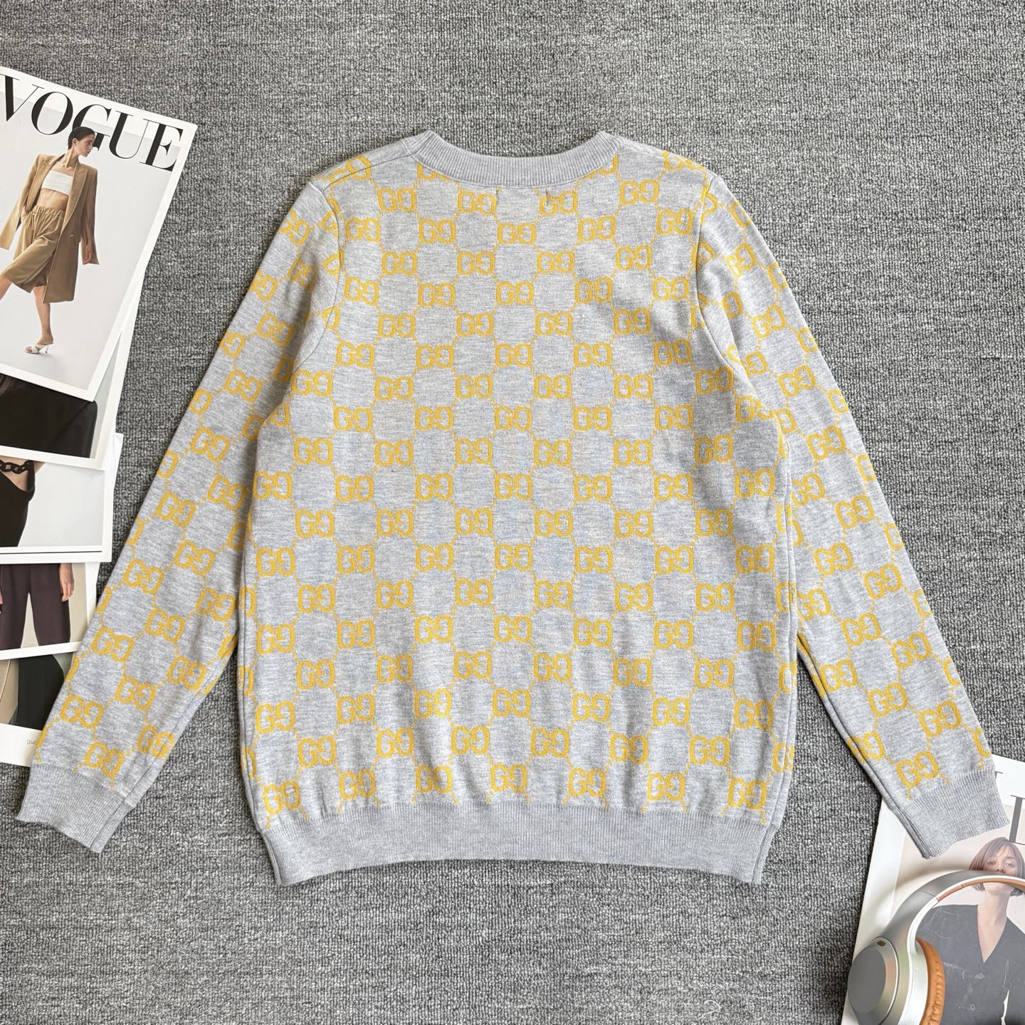 Long-sleeve knit sweater in heather gray with yellow GG logo allover pattern