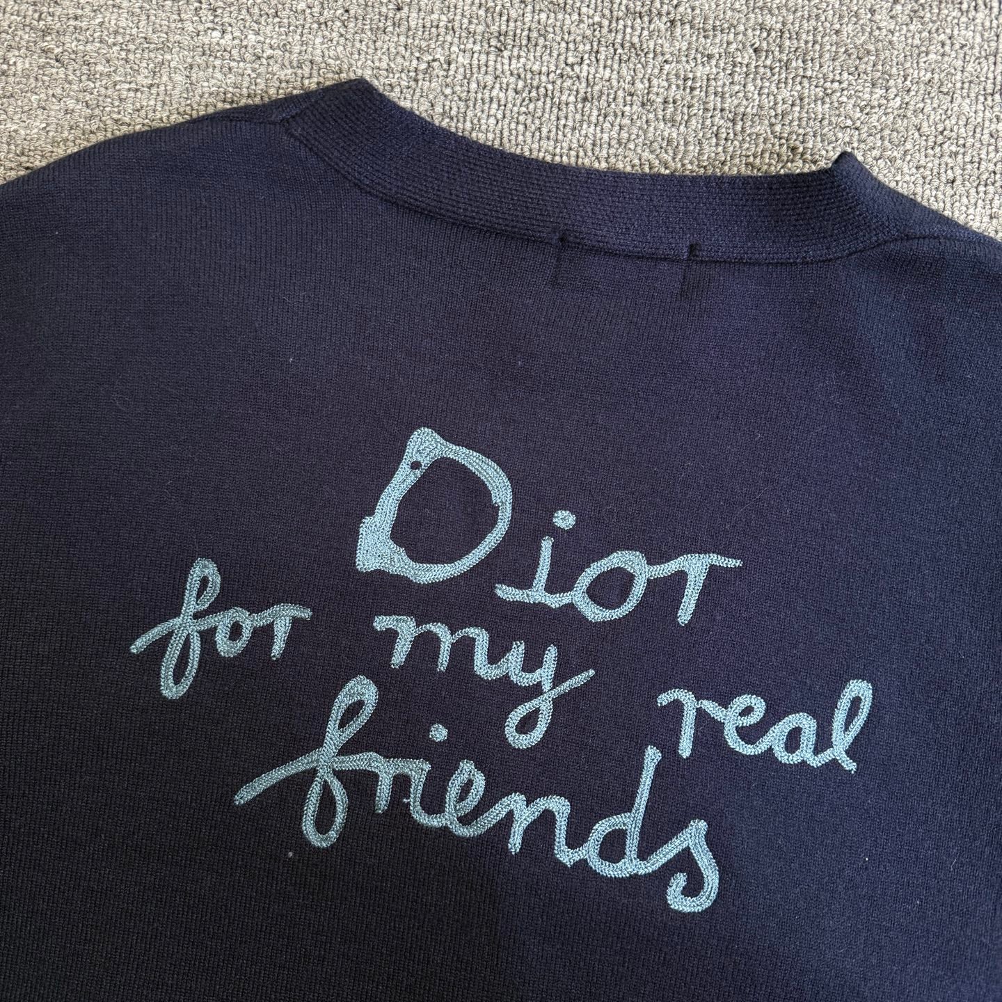 Navy Dior cardigan back with embroidered "Dior for my real friends" lettering
