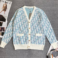 Long-sleeve knit cardigan with V-neck and button front, light blue and white patterned