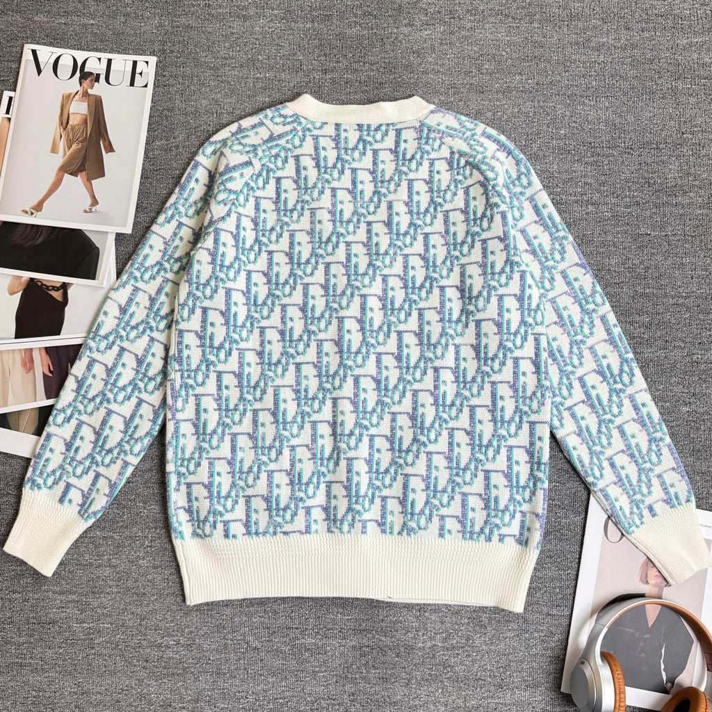 Light blue and white patterned knit cardigan with ribbed cuffs and hem, button front V-neck