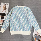 Light blue and white patterned knit cardigan with ribbed cuffs and hem, button front V-neck