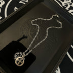 Silver-tone layered pendant necklace set with round medallion and longer chain