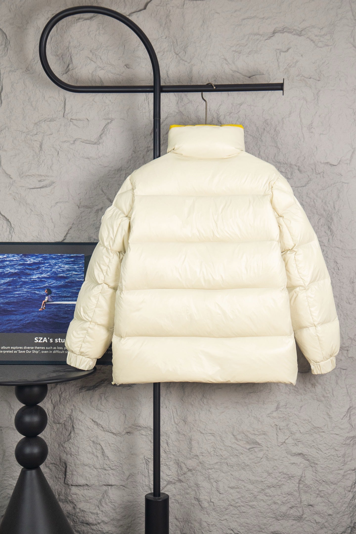 Long puffer jacket, cream quilted with high collar and yellow hood lining