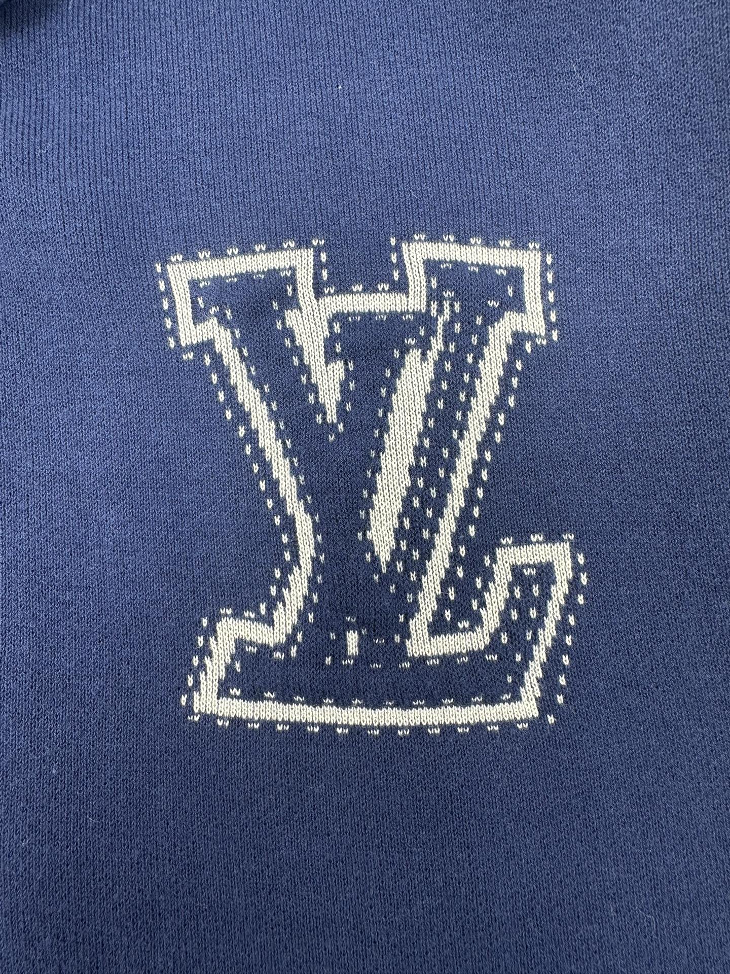 Louis Vuitton blue knit hoodie with large LV logo applique