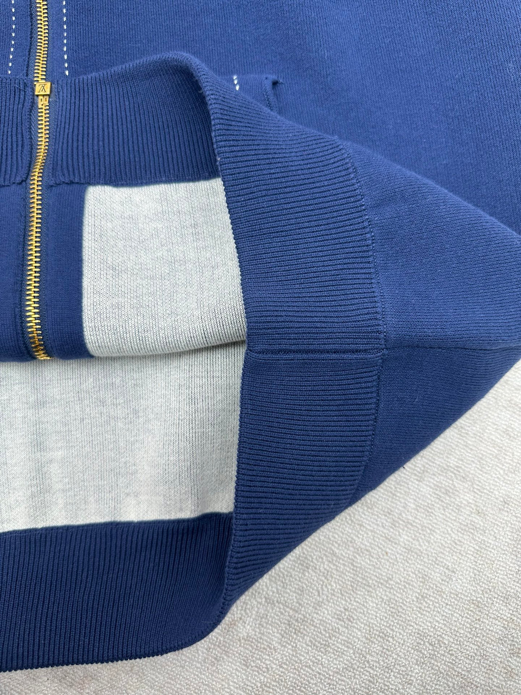 Louis Vuitton blue hoodie sleeve with ribbed cuff and contrast inner lining