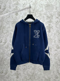 Louis Vuitton blue zip-up hoodie with LV logo, hood and front zip pockets