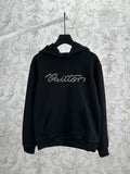 Louis Vuitton black hooded sweatshirt with front pocket and stitched logo
