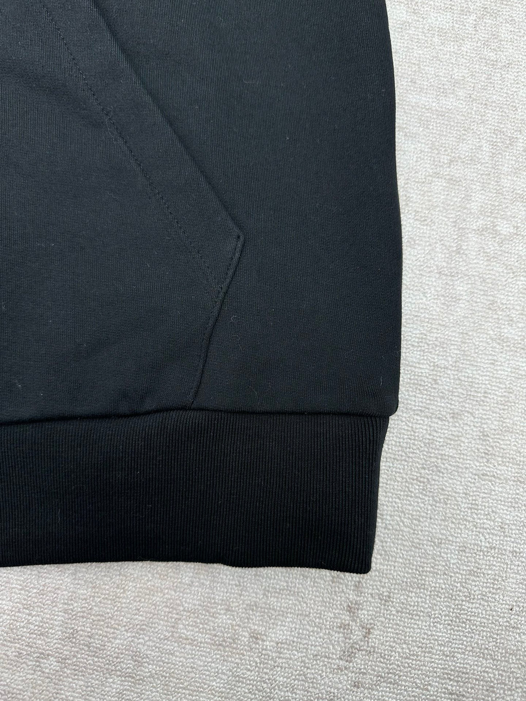 Louis Vuitton black hoodie ribbed sleeve cuff and seam close-up