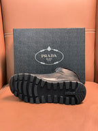 Prada boot outsole with thick lug tread and textured rubber pattern