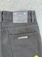 Chrome pants waist label and front closure in gray with metal button detail