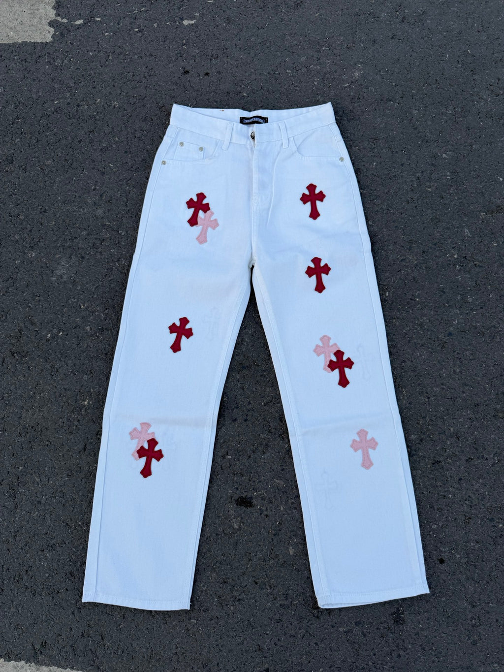 Light blue pants with red cross and darker red cross prints on front legs