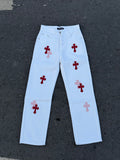 Light blue pants with red cross and darker red cross prints on front legs